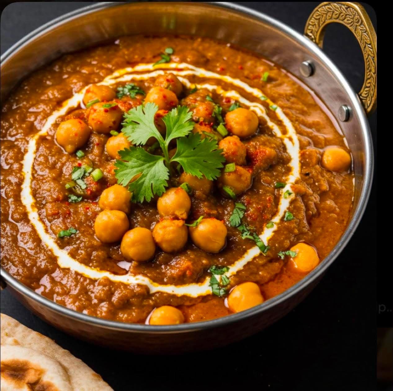 Chana Masala — Chickpeas cooked in a tomato and onion gravy with spices and herbs — a hearty, protein-rich vegetarian classic.