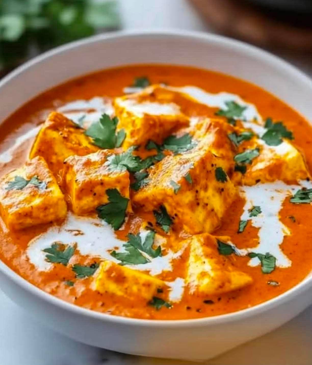 Paneer Butter Masala with cream and coriander